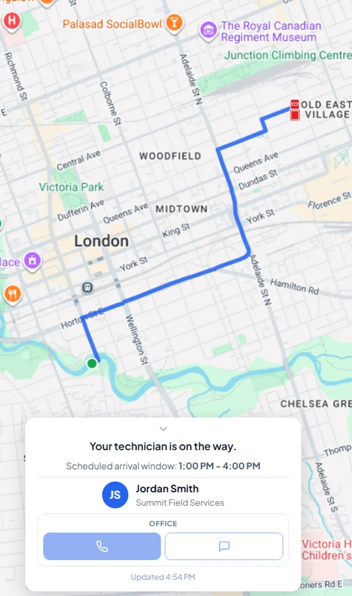 A customer's phone showing their technician on the way, with a live map and ETA